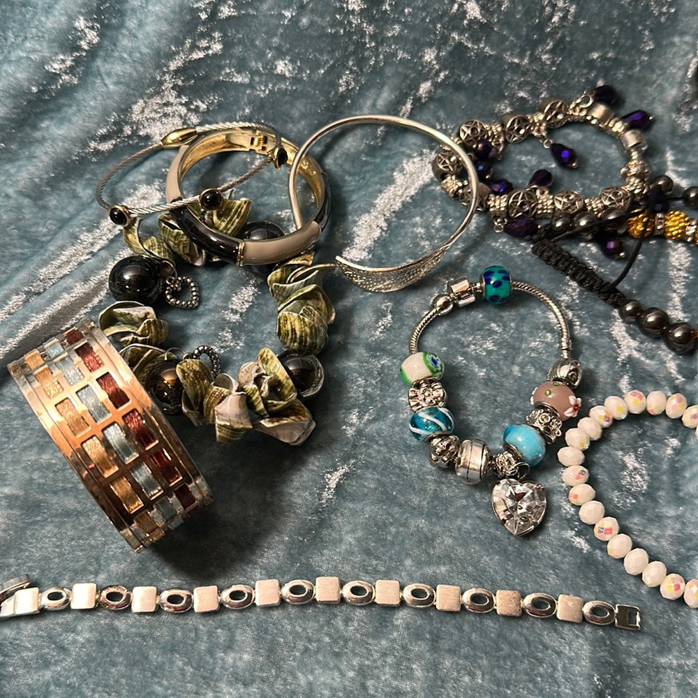 Random assortment of 10 bracelets.